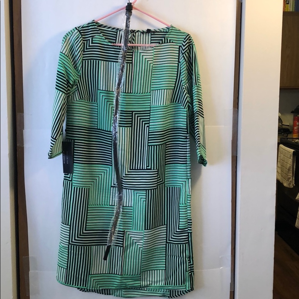 Green and black belted shift dress.